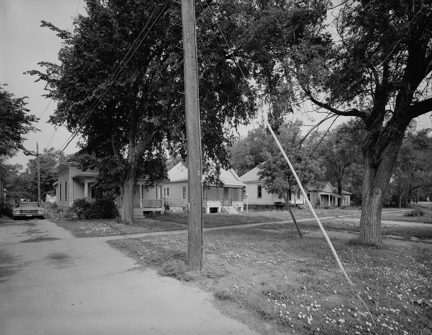 Small frame houses lining a street in the South Bottoms Historic District of Lincoln, Nebraska