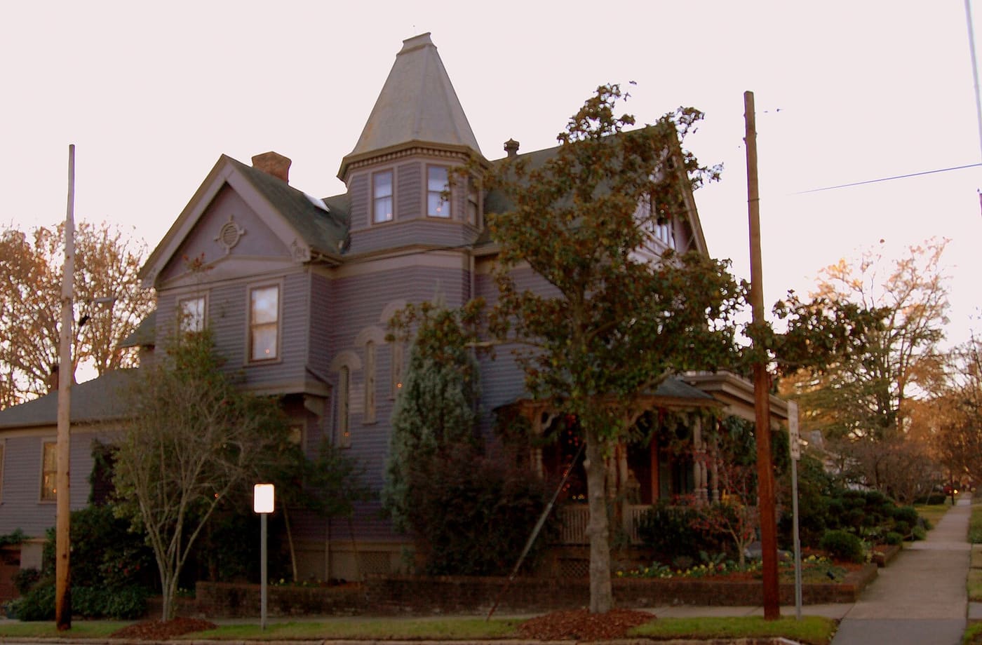A historic wood-frame house with a covered porch in the Oakwood neighborhood of Raleigh, North Carolina