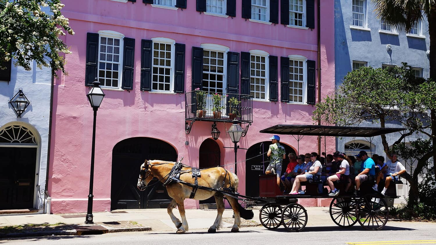 The painted Georgian rowhouses of Rainbow Row along East Bay Street in Charleston, South Carolina